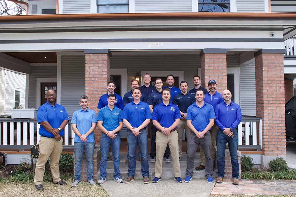 The New View Roofing team outside their Dallas office on Gaston Avenue